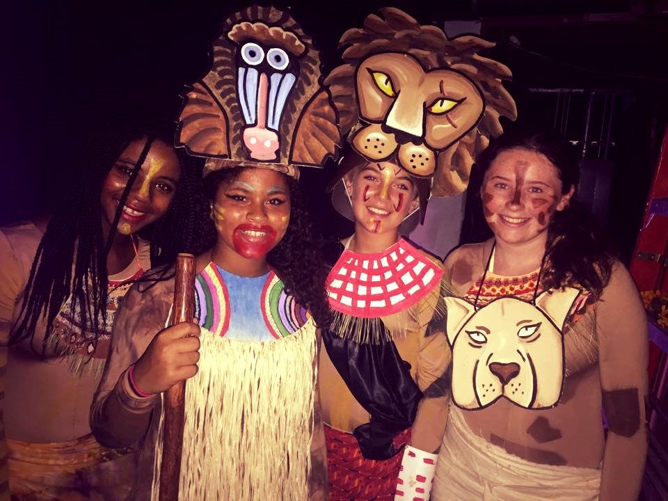 Lion King Jr. cast members in their masks
