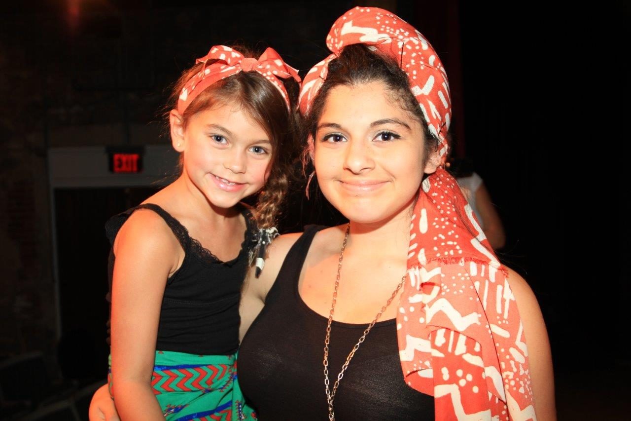 Two campers in headscarves