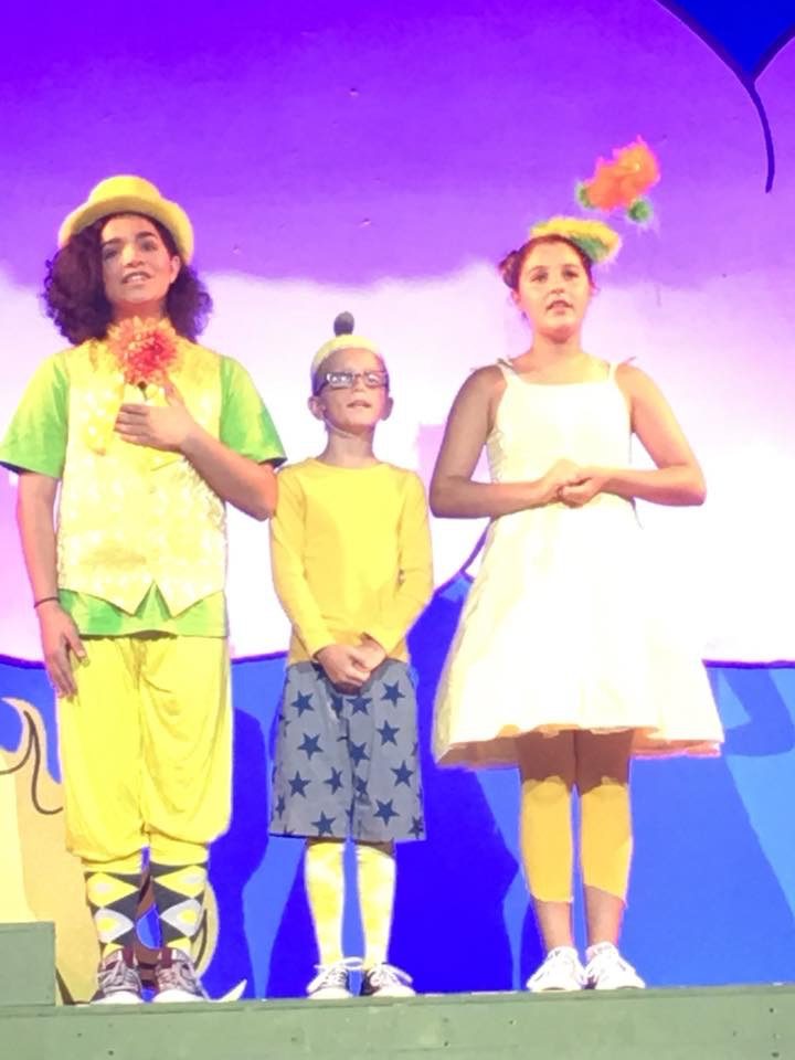 Performers in Seussical costumes