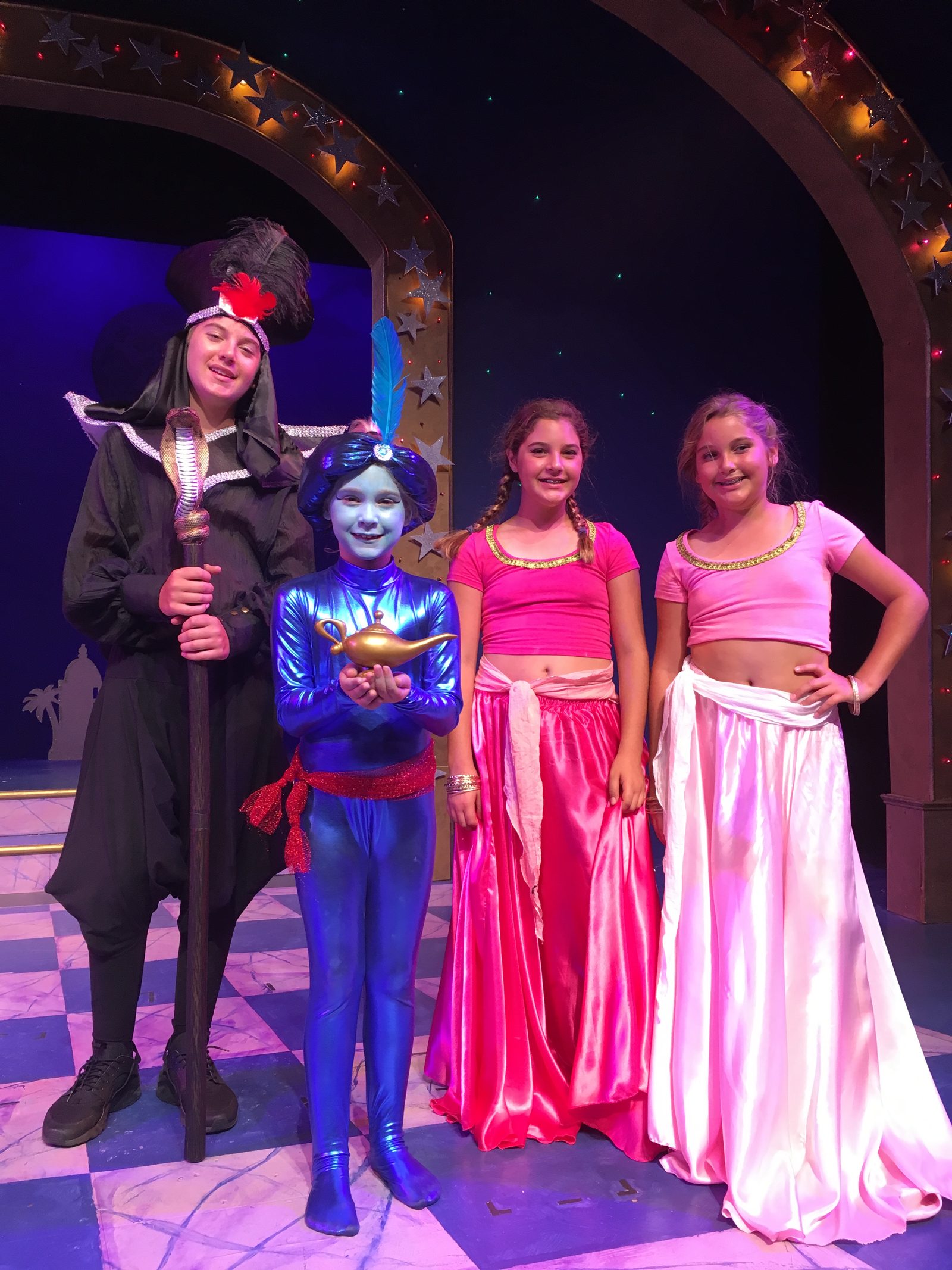 Aladdin Jr. cast members on stage