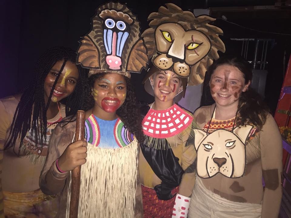Lion King Jr. cast members in their masks