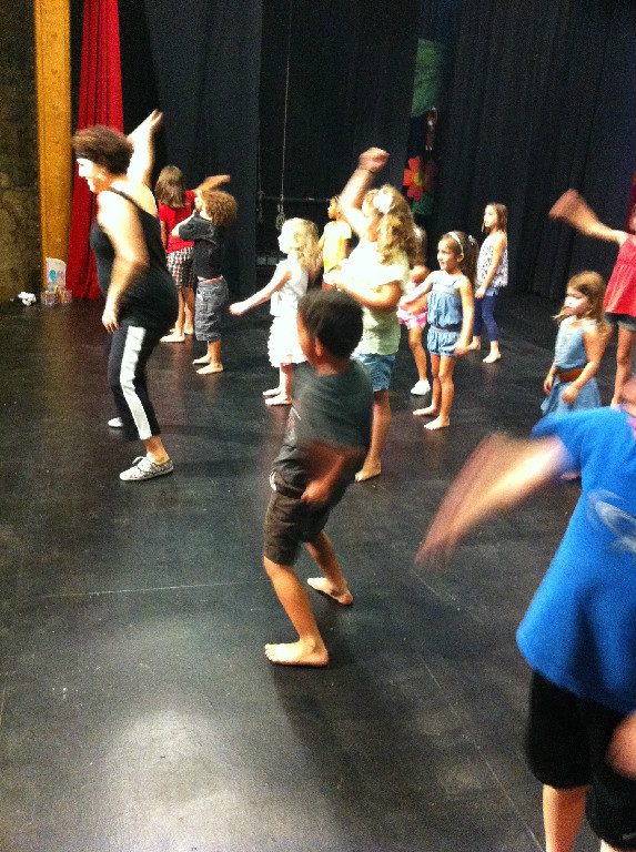 Campers rehearsing a dance